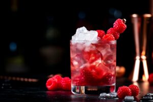 Summer,Alcoholic,Cocktail,With,Mashed,Raspberries,,Gin,,Vodka,,Soda,,And