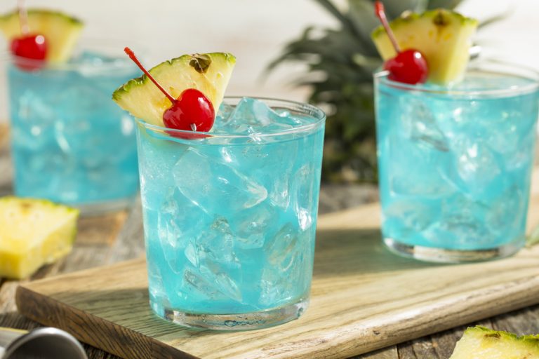 Refreshing,Blue,Hawaii,Cocktail,Punch,With,Pineapple,And,Cherry