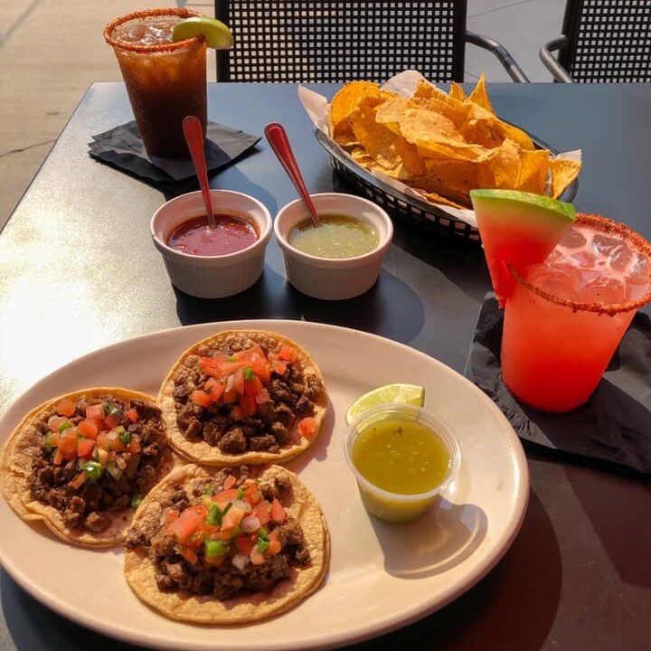 Del Toro - Tacos on the patio with chips and salsa and 2 cocktails