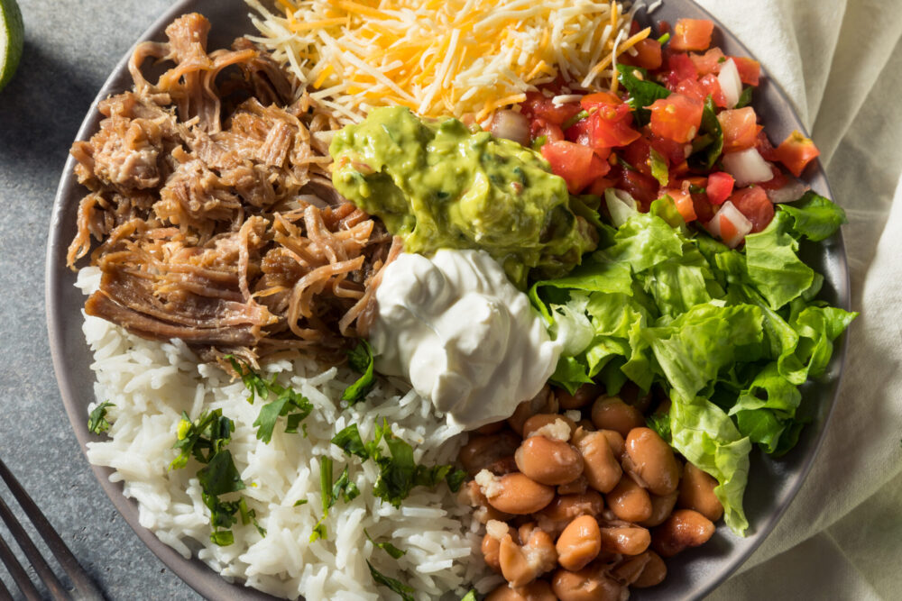 Healthy,Homemade,Mexican,Carnitas,Burrito,Bowl,Cilantro,And,Guacamole