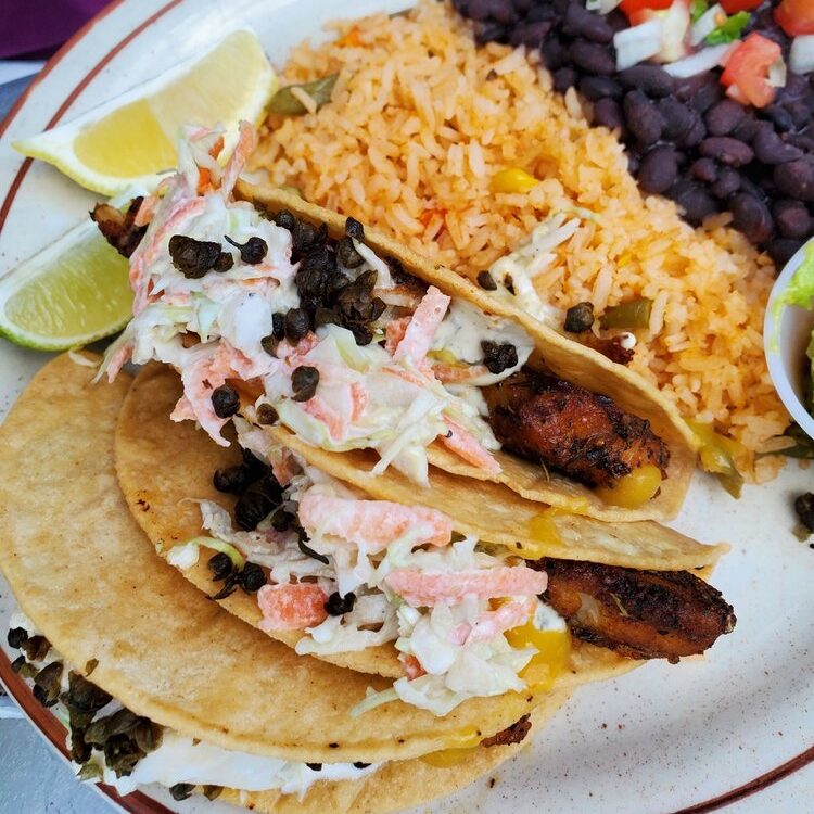 Blackened fish taco plate with rice and black beans