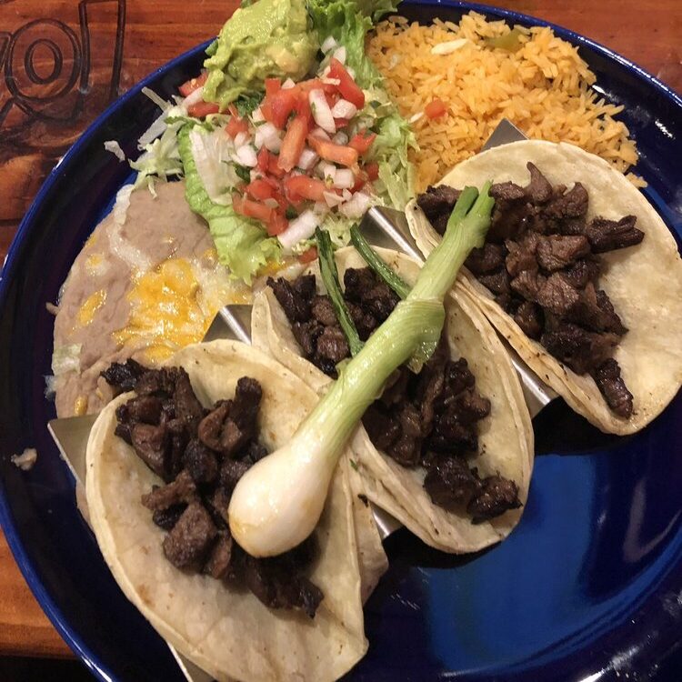 Carne asada taco plate with rice and beans