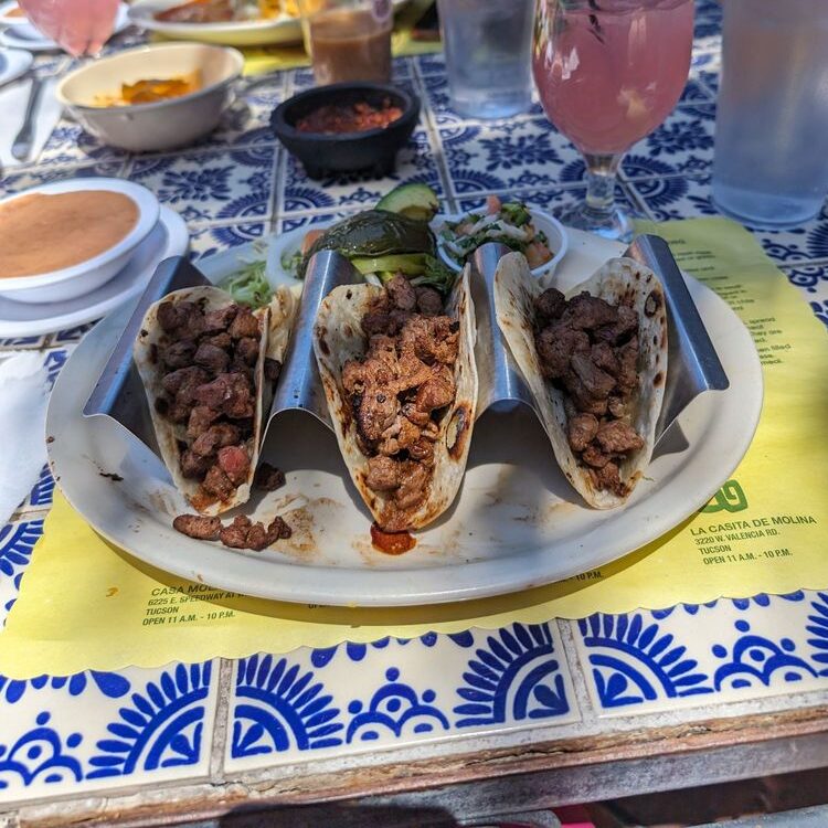Carne asada tacos, prickly pear margarita