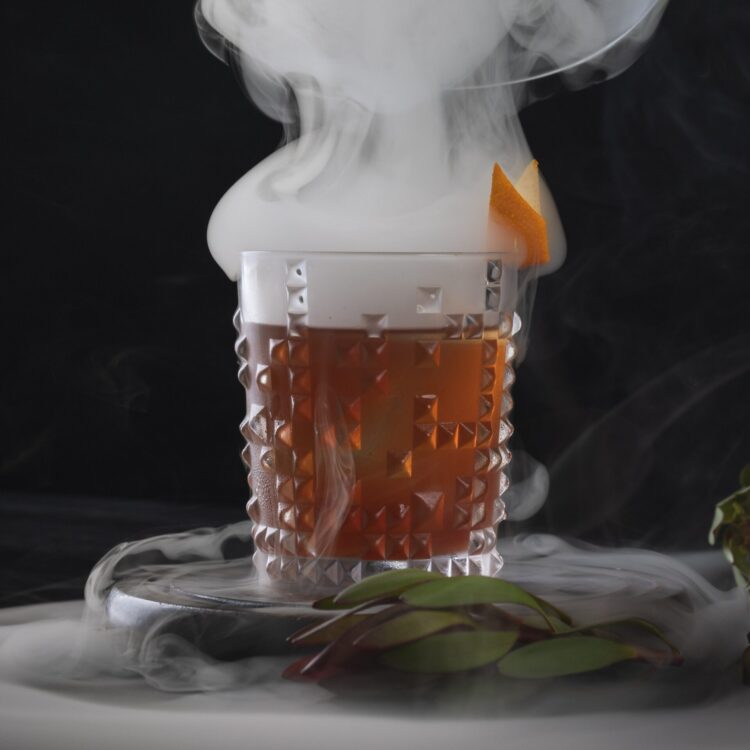 PAPASITO - cinnamon apple infused makers mark, bitters, mexican spiced syrup, washed with brown butter, applewood smoke