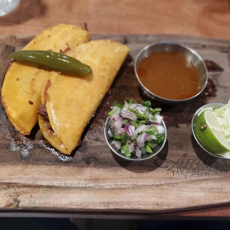 Quesa birria tacos with consome