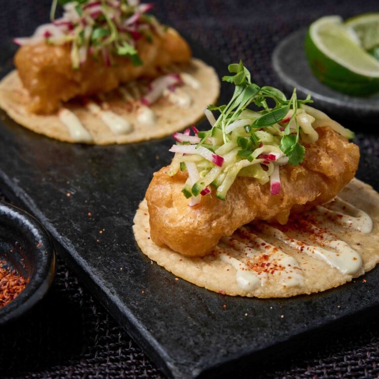 Sea Bass Tacos - beer-battered, cucumber radish slaw, habanero crema