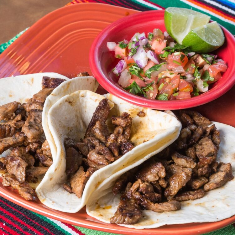 3 Steak tacos with a side of Pico de gallo
