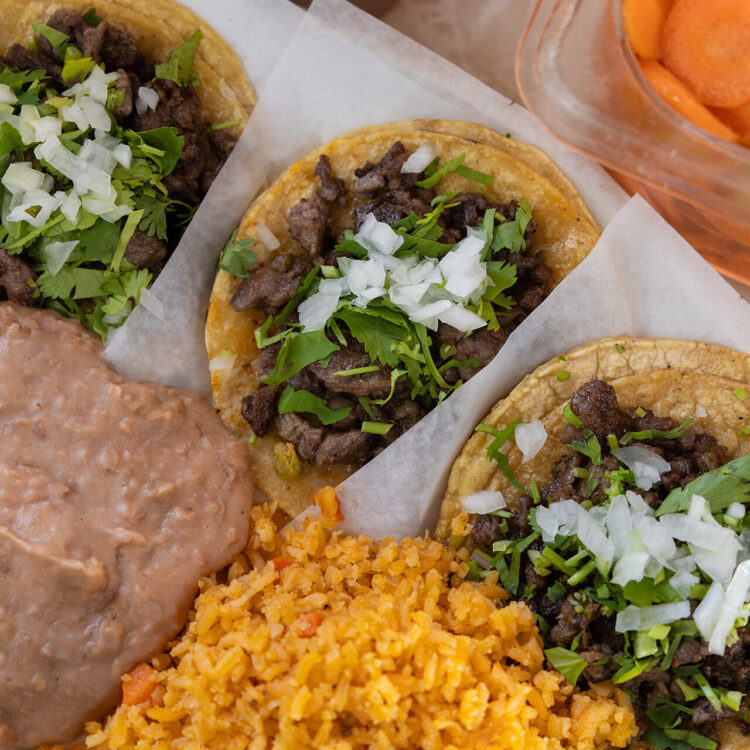 3 steak tacos with beans and rice