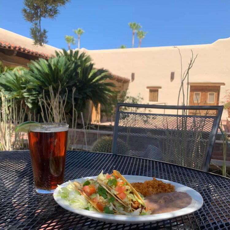 2 taco Plate with rice and beans on the patio