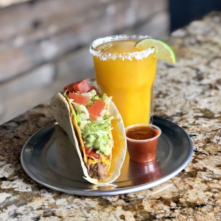 Pinto Bean Queso Loco with mango margarita