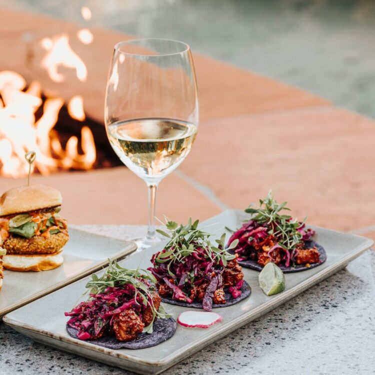 Tacos and glass of wine by the firepit