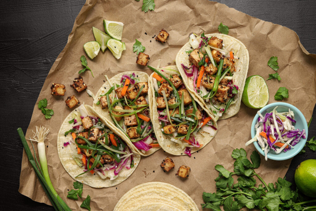 AnOverheadShotOfFourVeganTacosWithTofuCilantro
