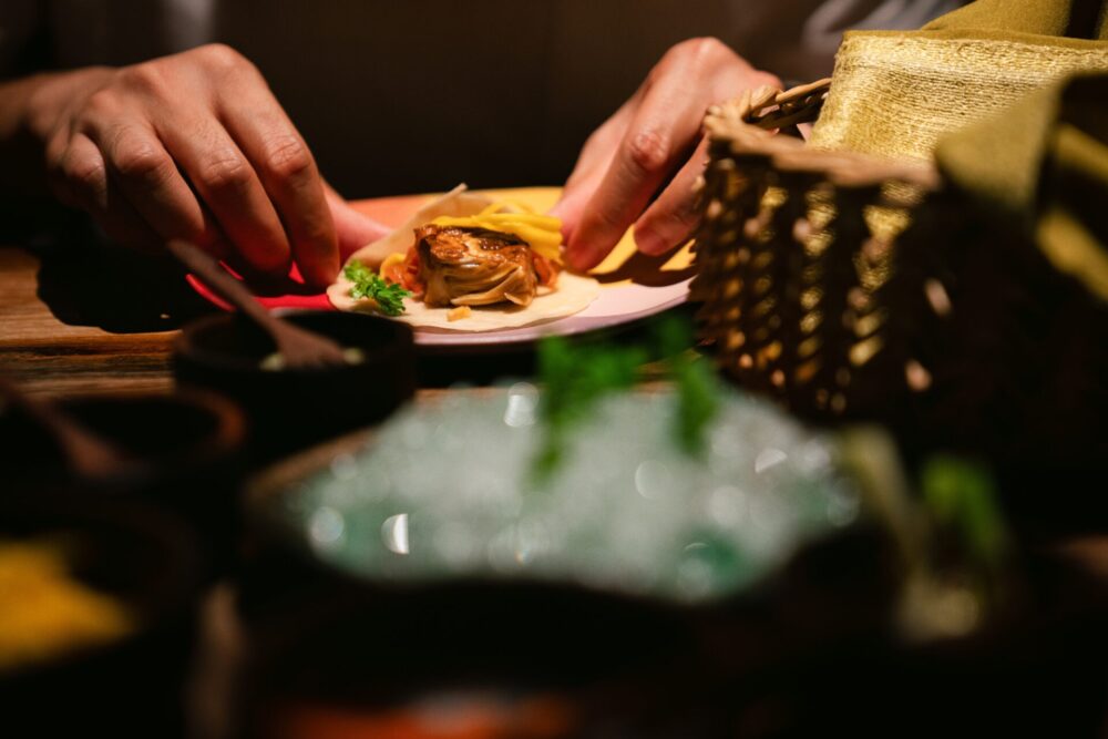 Close-up,Of,Hands,Preparing,Gourmet,Taco