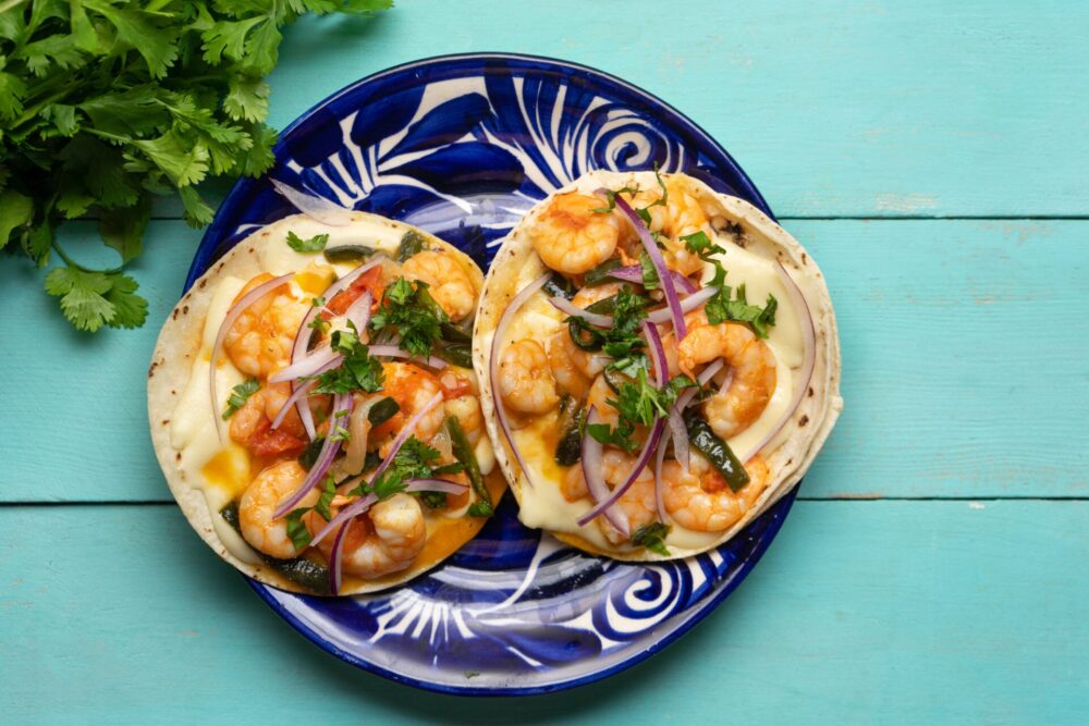 Traditional,Mexican,Food.,Shrimp,Tacos,With,Melted,Cheese,And,Poblano