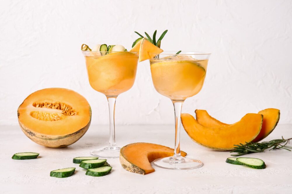Glasses,Of,Cold,Cocktail,,Melon,And,Slices,Of,Cucumber,On