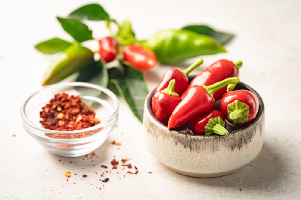 Fresh,And,Powdered,Red,Hot,Chilli,Pepper,Pattern,On,White