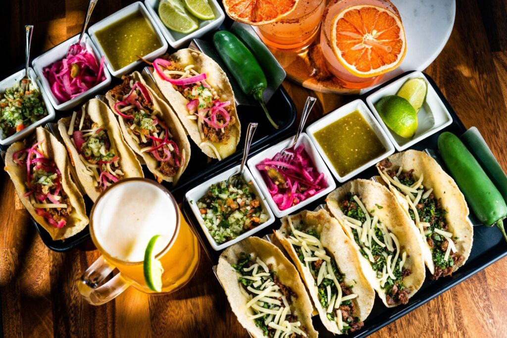 Beef,And,Pork,Tacos,Served,With,Beer,And,Tequlia,Cocktails.