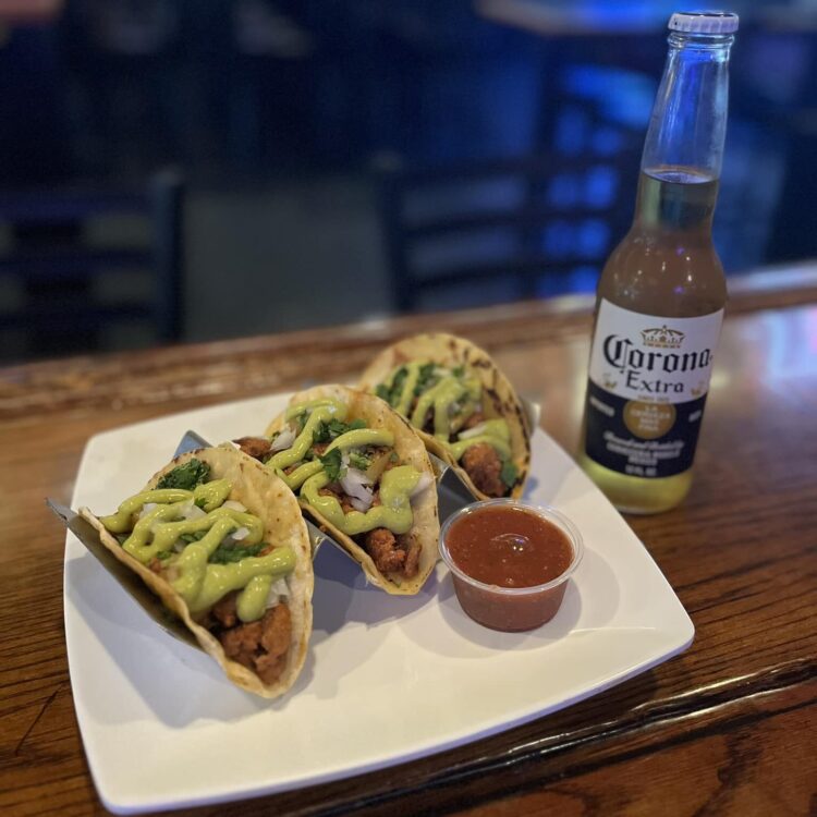 Al pastor tacos and a beer