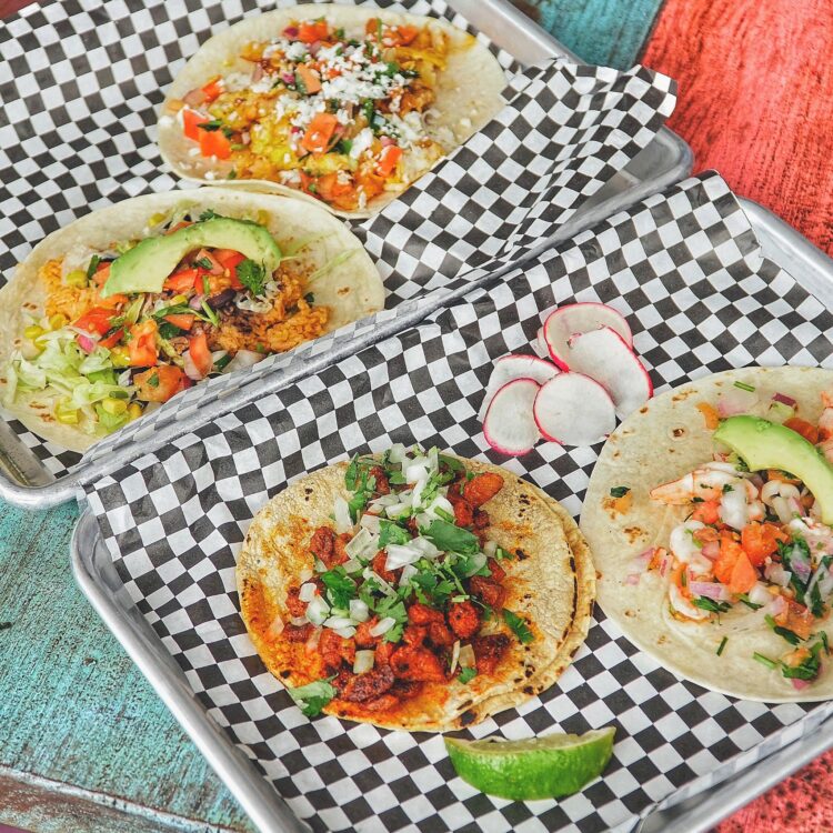 2 trays with tacos