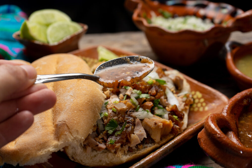 Confit,Pork,Sandwich,Called,Torta,De,Carnitas,On,Wooden,Background.
