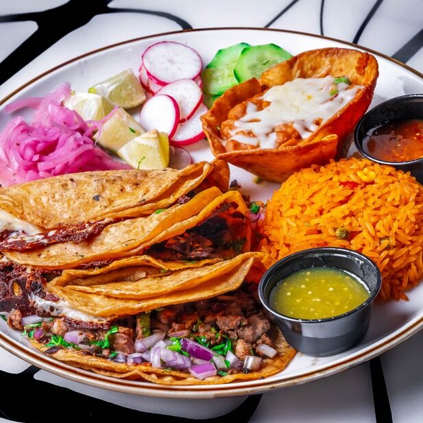 rib-eye tacos with a golden cheese crust