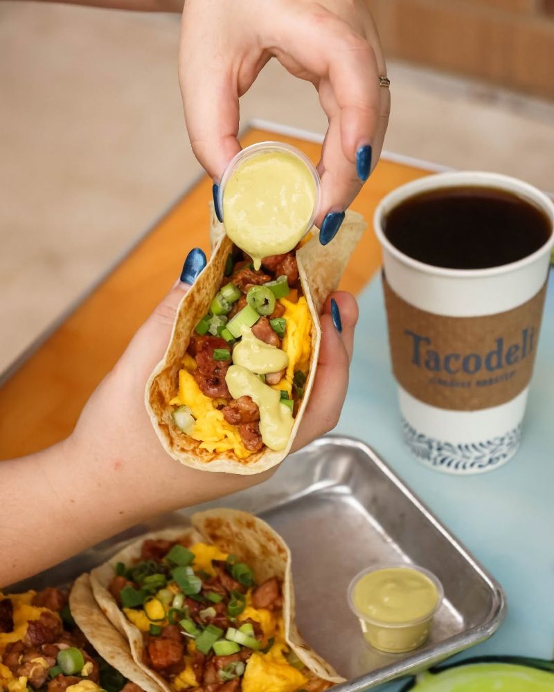 Tacodeli Breakfast Tacos with Sauce and coffee