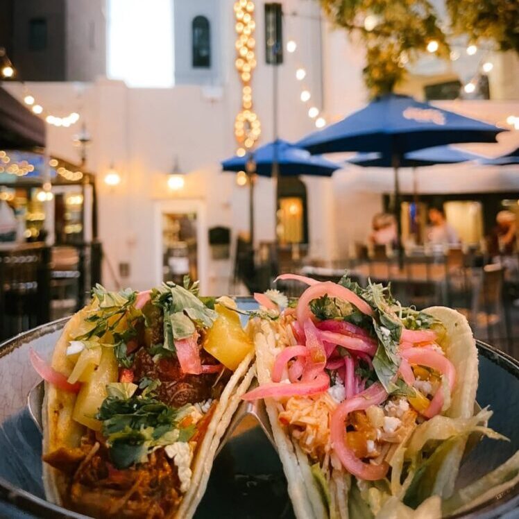 Two tacos on the patio