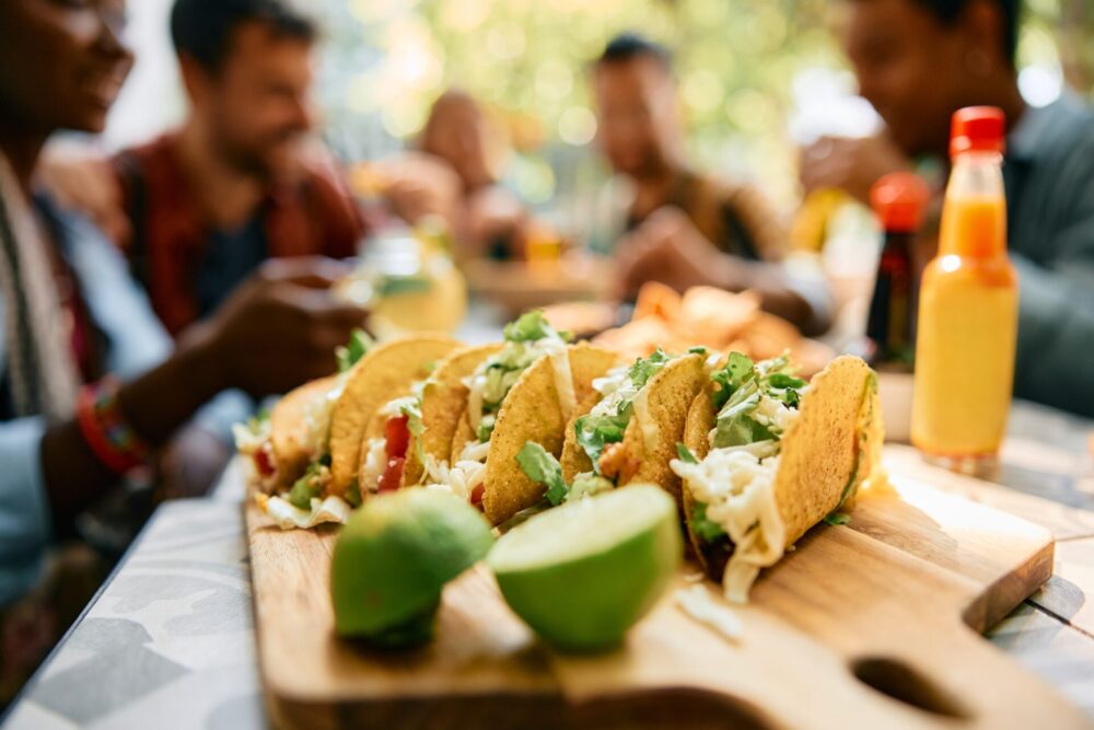 Ready,To,Eat,Tacos,With,Group,Of,People,In,The