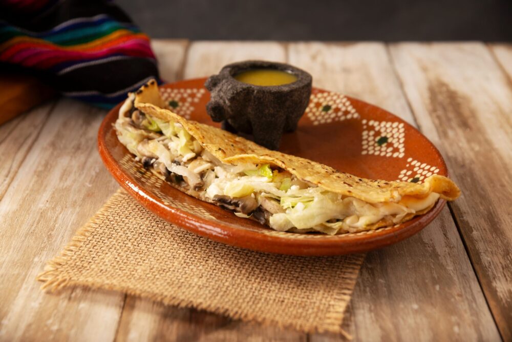 Mushroom,And,Cheese,Quesadilla,Made,On,A,Comal.,Traditional,Mexican