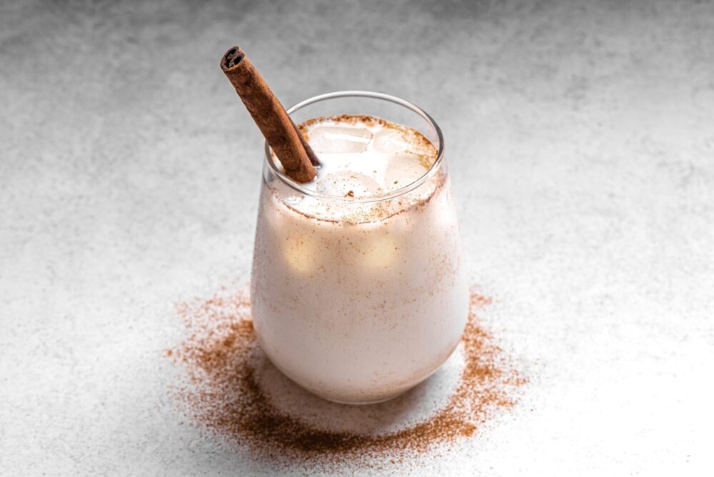 Mexican,Horchata,With,Cinnamon,In,Glass,On,White,Background.,Fresh